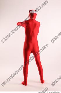 JOEL_ADAMSON CHRISTMAS VILLAIN WITH TWO GUNS